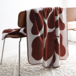 Red-Brown Abstract Floral Reversible Decorative Throw – A Modern Art-Inspired Sofa Blanket